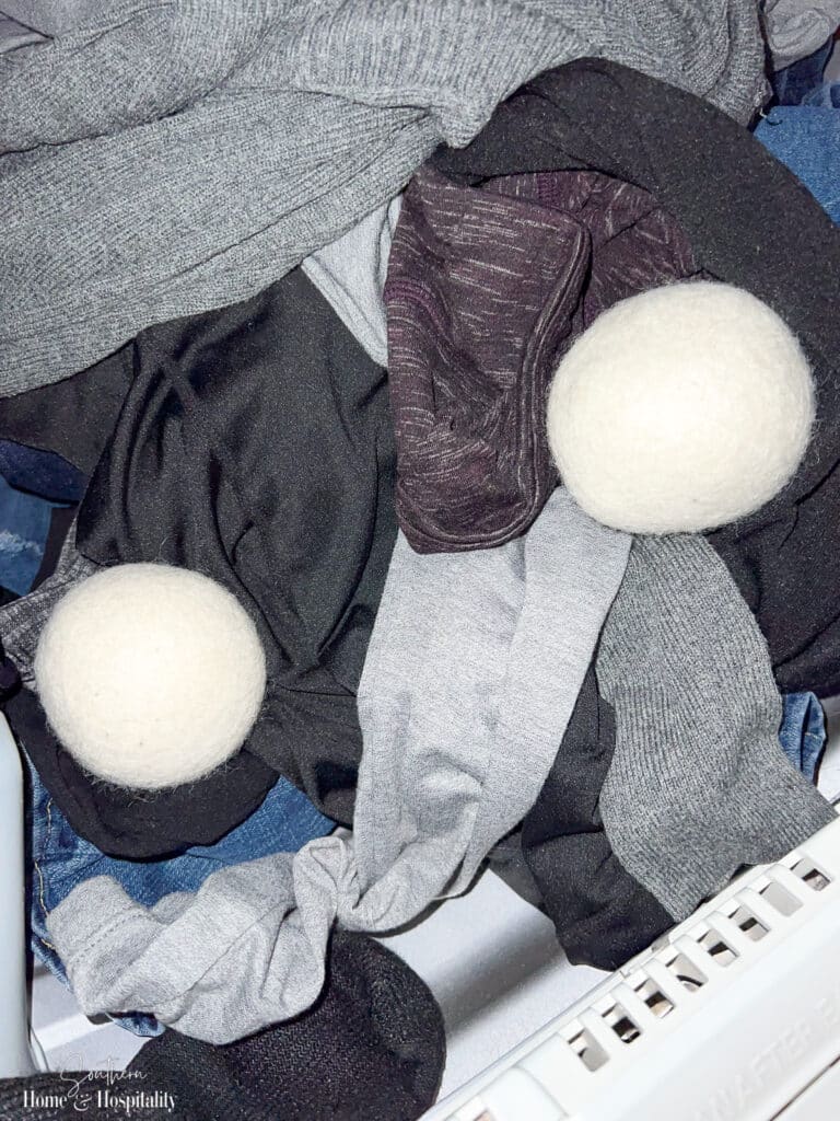 Wool dryer balls in a load of laundry