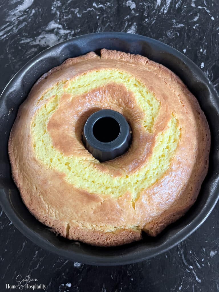 Baked lemon bundt cake in pan