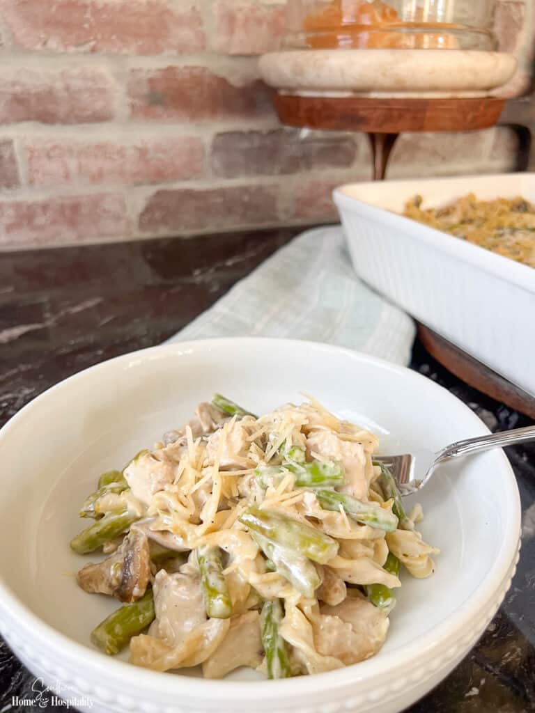 Serving of cheesy chicken and asparagus casserole