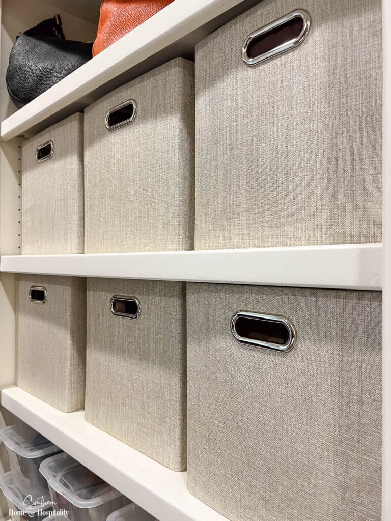 Linen fabric storage cubes in closet