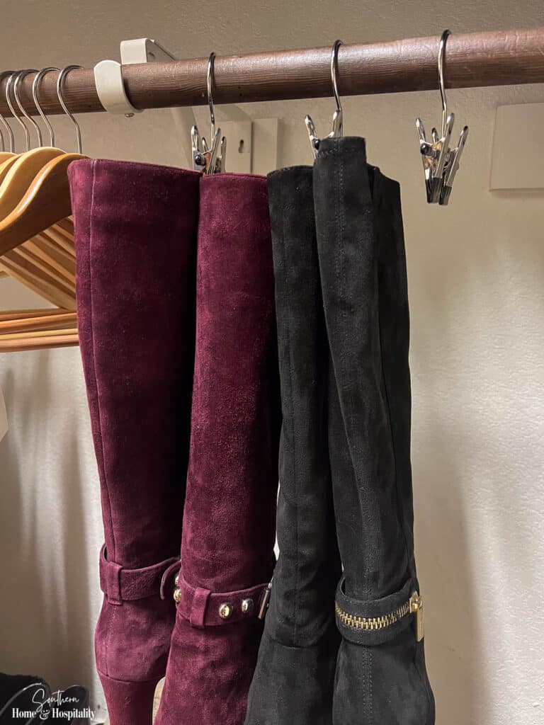 Boot hangers on closet rod
