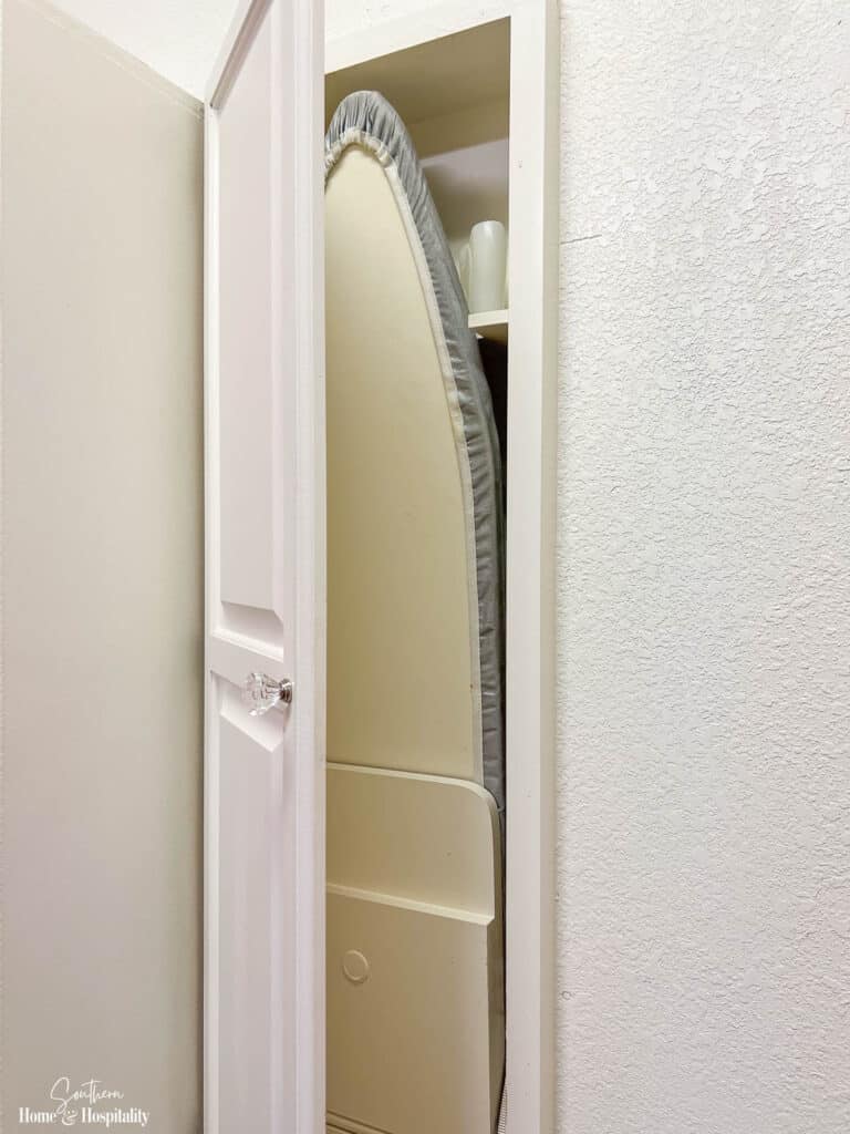 Built in ironing board in primary closet