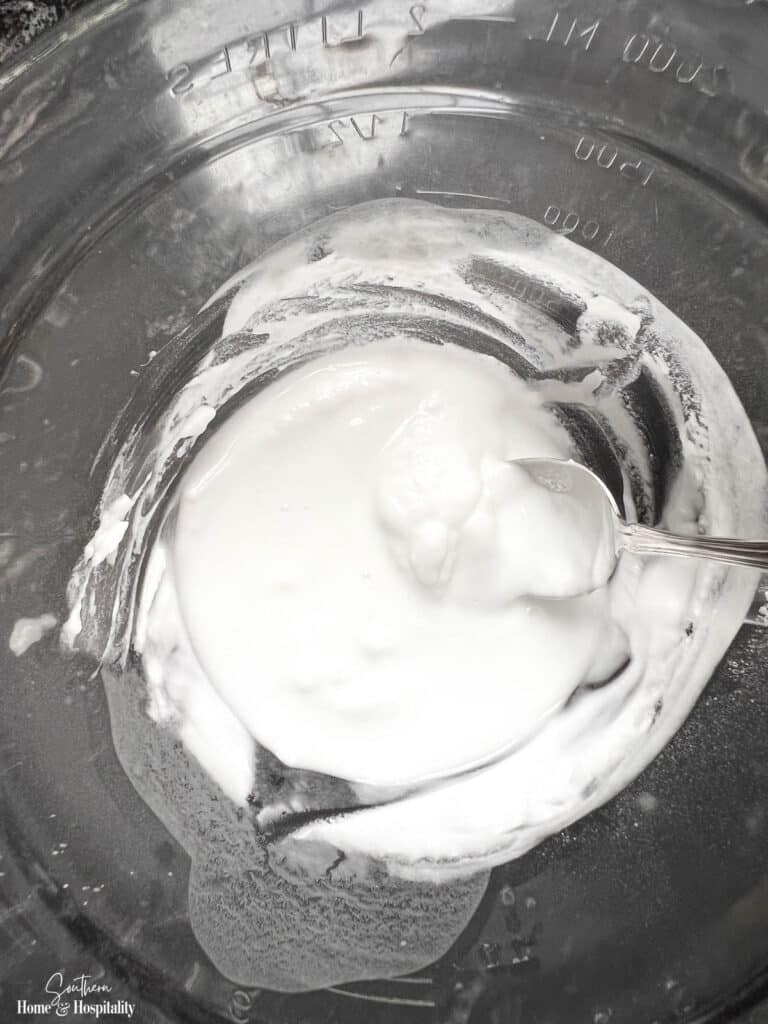 Making baking soda paste for oven cleaning