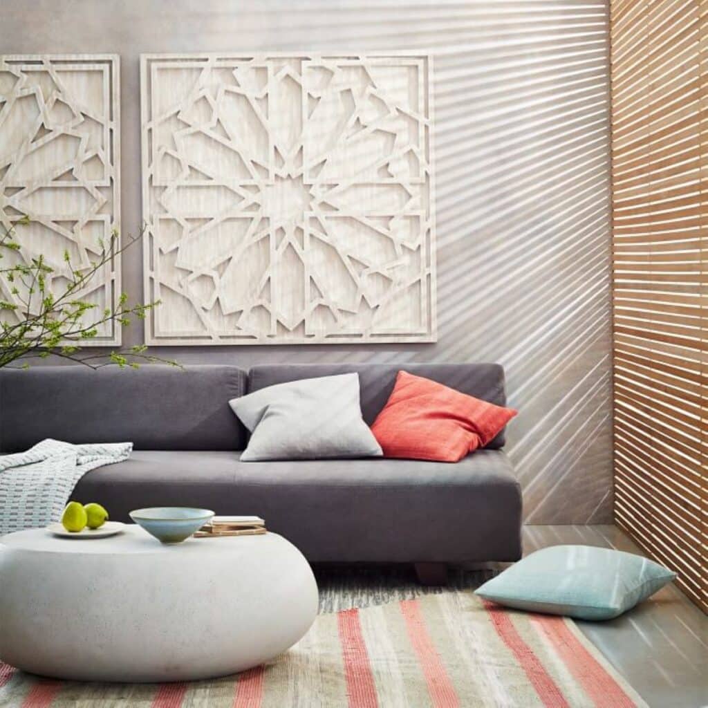 Oversize wood design wall art above a sofa