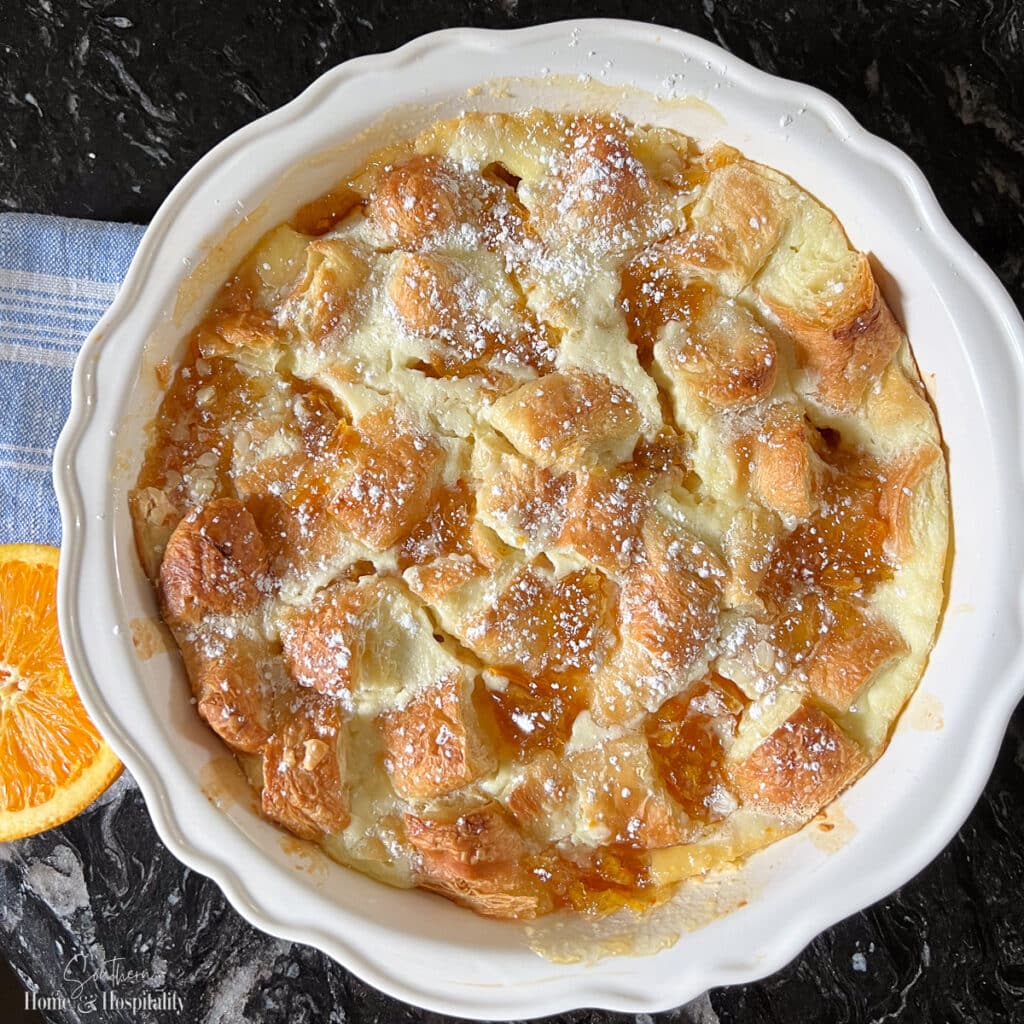 Orange croissant breakfast bake in a pie plate