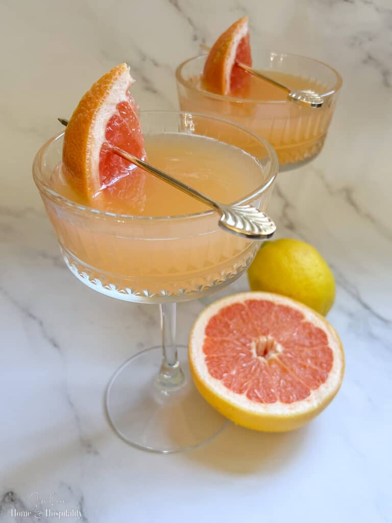 French Blond cocktail in coupe glass with grapefruit wedge