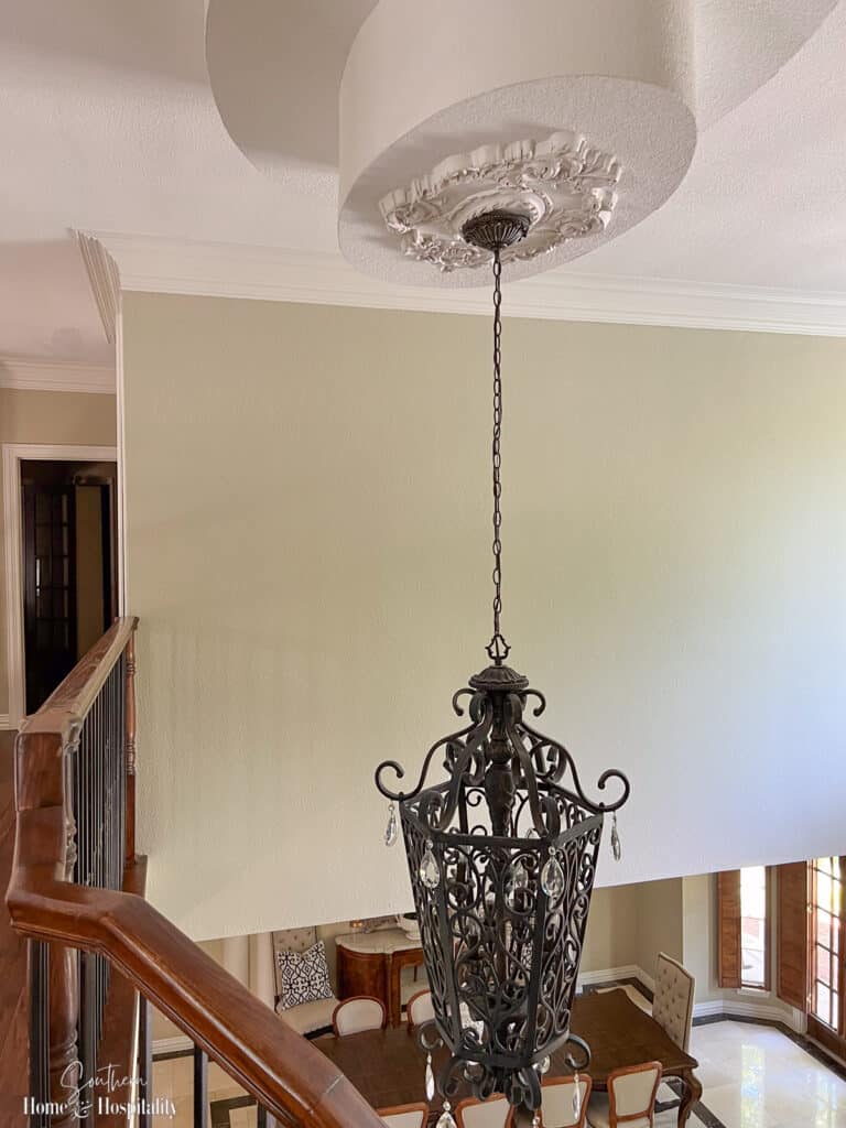 Foyer lantern with ornate ceiling medallion