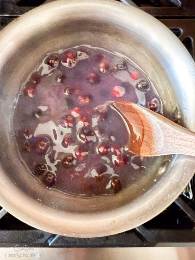 Making homemade blueberry sauce