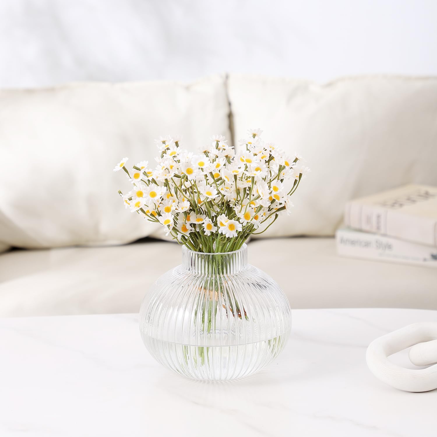 Ribbed clear vase with flowers