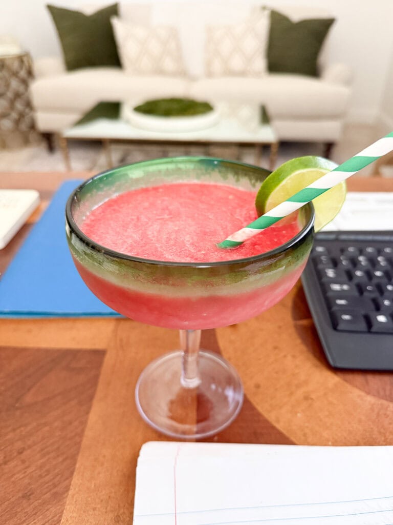 Watermelon cocktail on desk in office