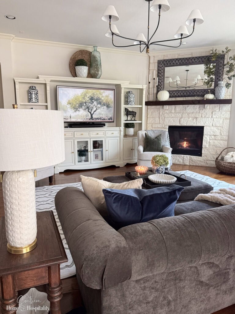 Family room fall decor with blue and green accents instead of orange.