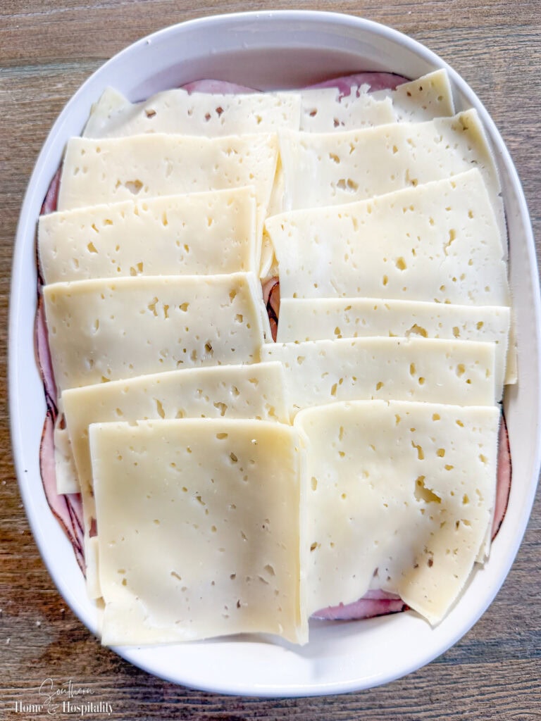 Second layer of cheese on top of ham and cheese.
