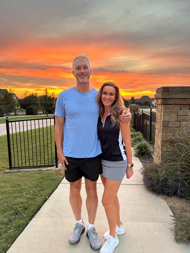 Couple in front of sunset