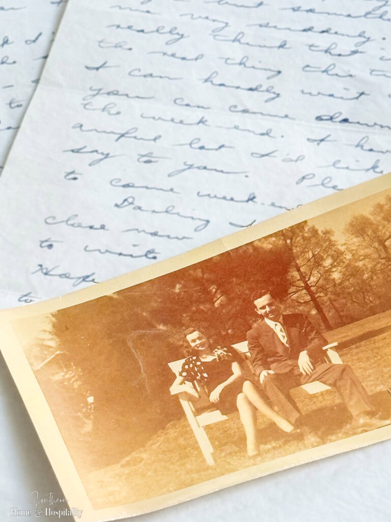 Vintage black-and-white photograph of a couple with a handwritten love letter