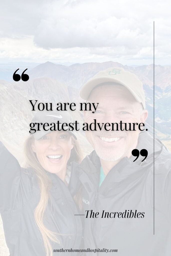 Couple standing together on a mountain overlook
