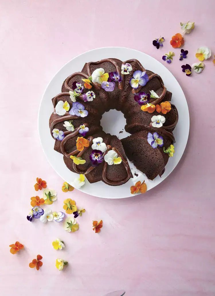 Chocolate cake decorated with violas