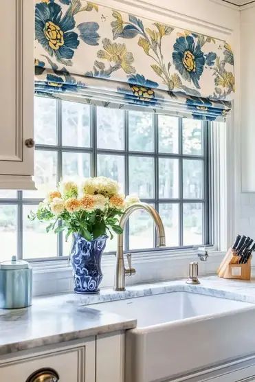Colorful floral shade over kitchen sink window