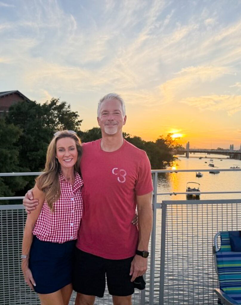 Kate and her boyfriend in front of the Brazos at sunset