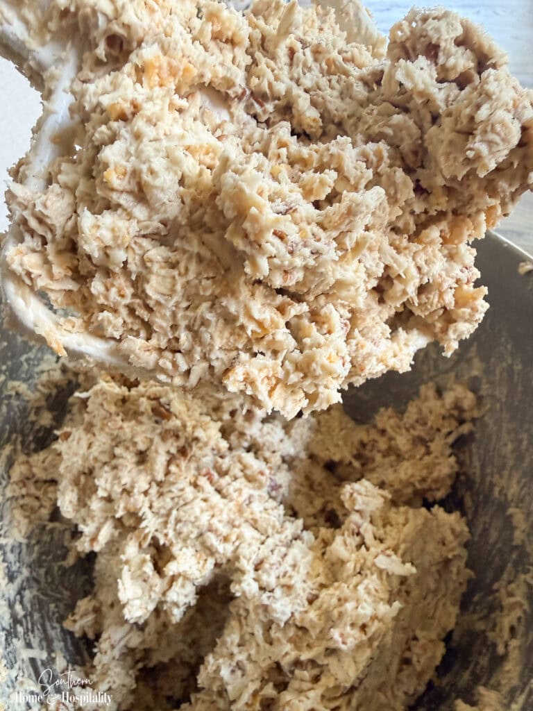 Finished Ranger Cookie dough mixed with oats, cornflakes, coconut, and pecans.