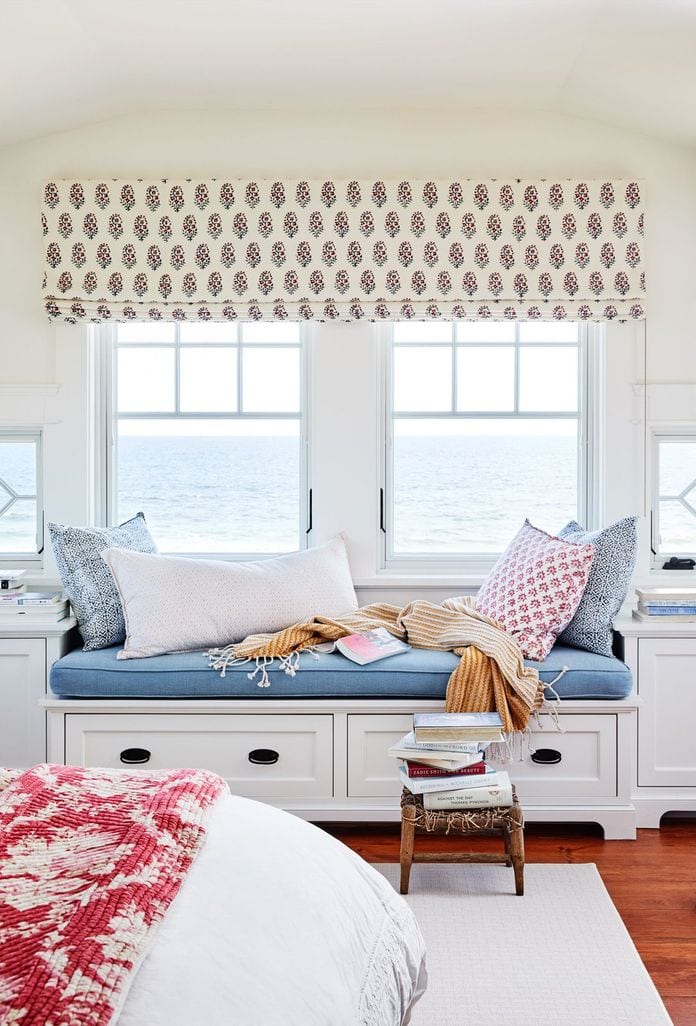Window seat in a coastal bedroom