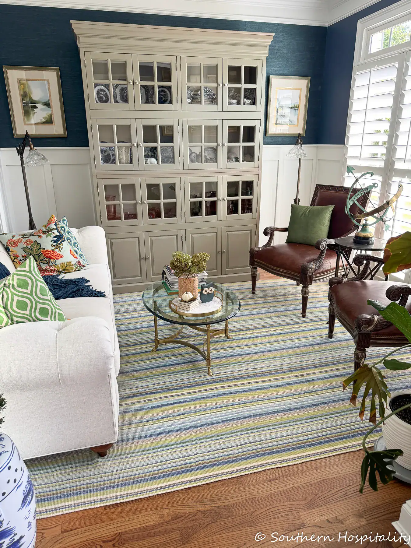 Blue and green living room decorated with fall touches
