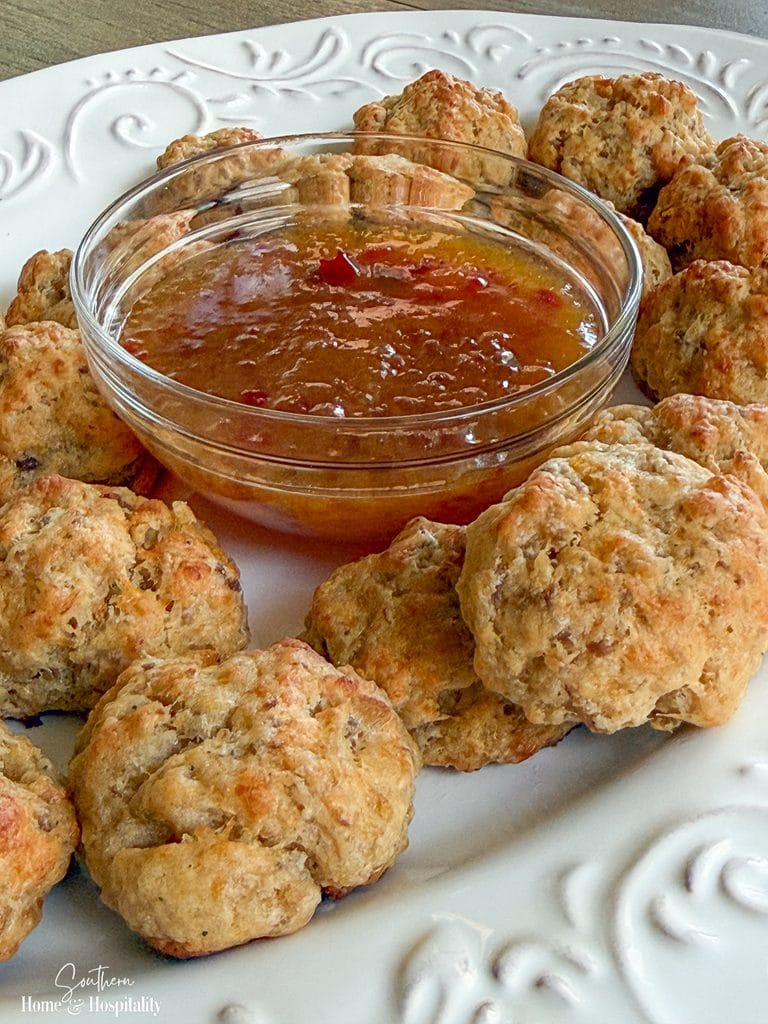 Cheesy cream cheese sausage balls served with red pepper jelly-Dijon dipping sauce