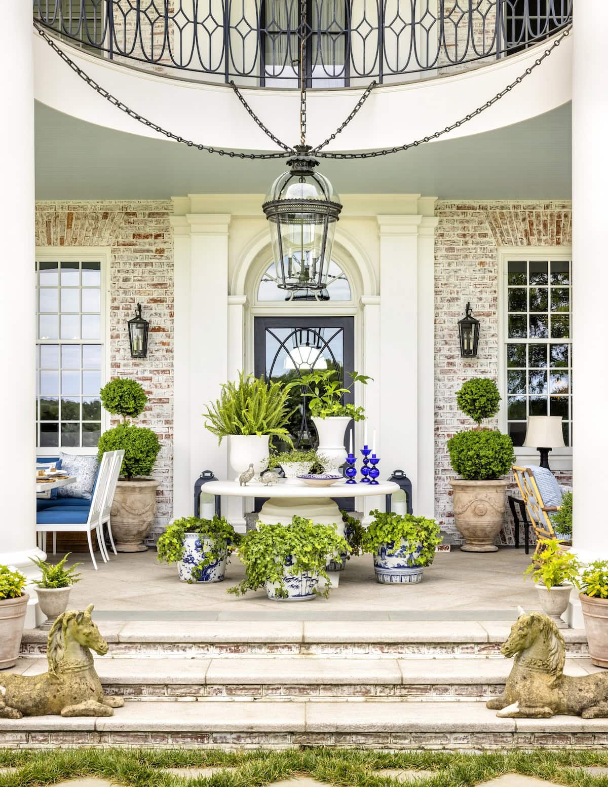 Grand Chesapeake Bay front porch with potted plants